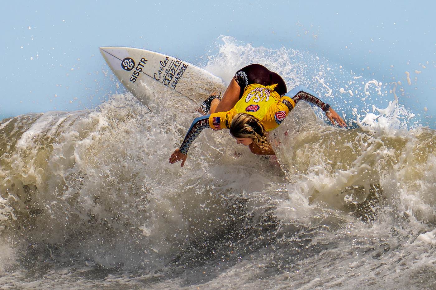 Lanea Mons throws spray off the top at a First Coast contest