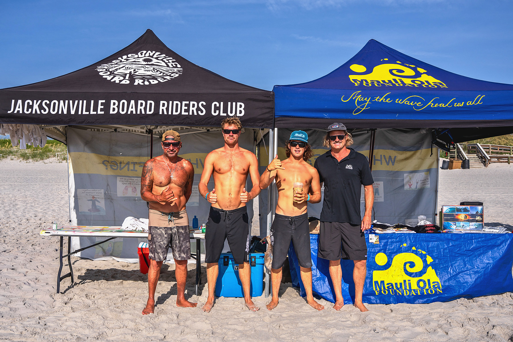 Volunteers from Jacksonville Board Riders and Mauli Ola Foundation before the first session. Most of them would not leave the water for three hours.