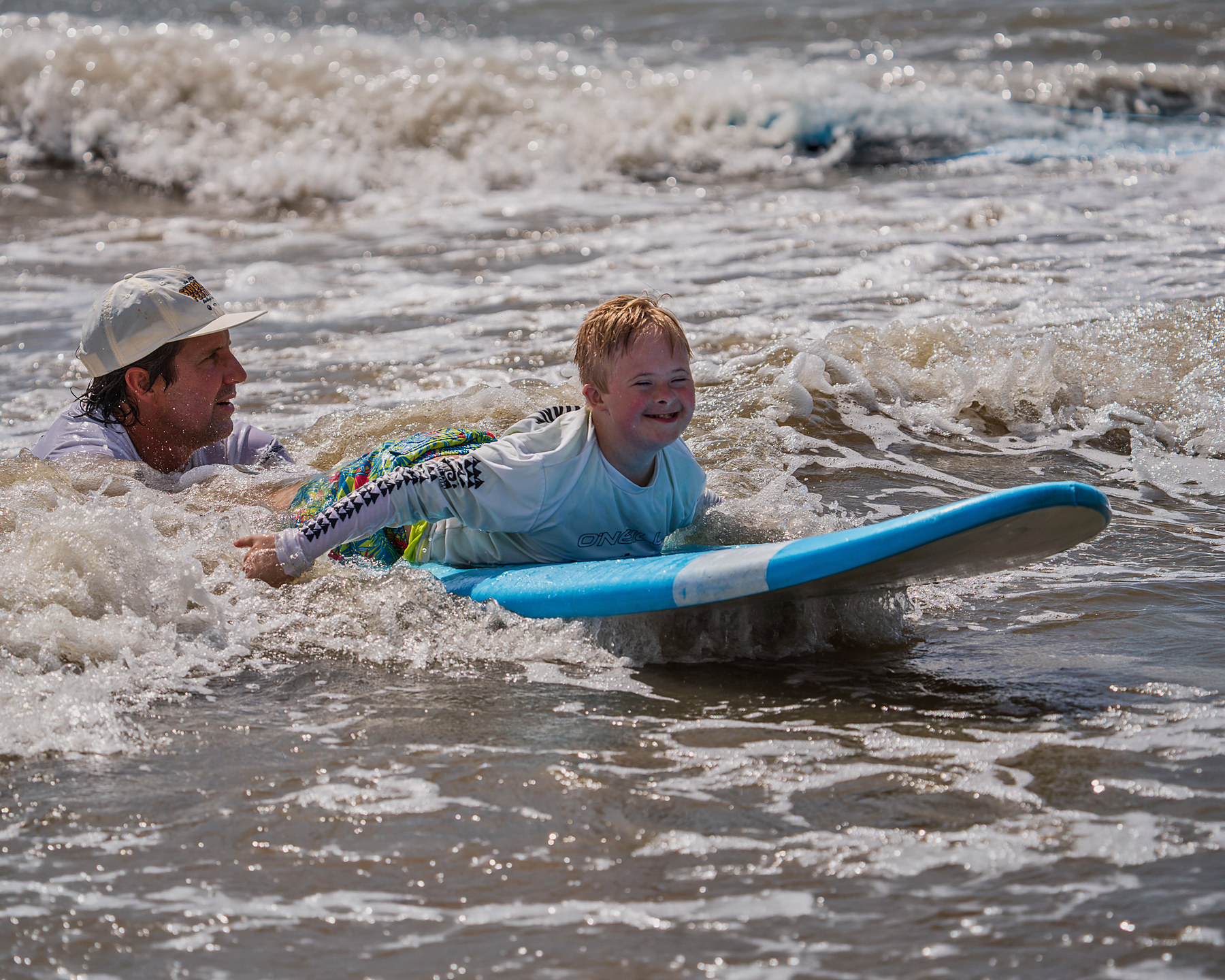 The first wave of the session for this surfer, taken prone.